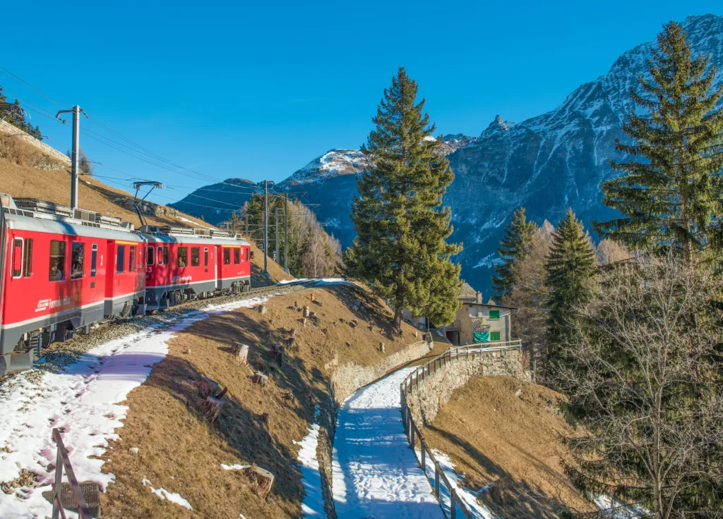 Train Travelling through Swiss Alps - How To Plan The Perfect European Rail Journey